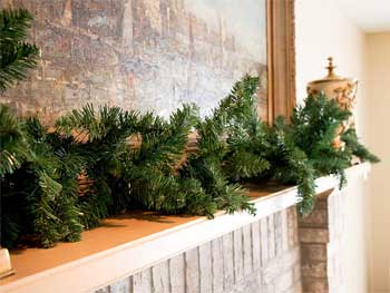 Clever Creations Artificial Pine Garland on Fireplace Mantel